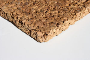A brown granule material in a rectangle shape against a white background.