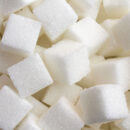 A close up shot of several sugar cubes.